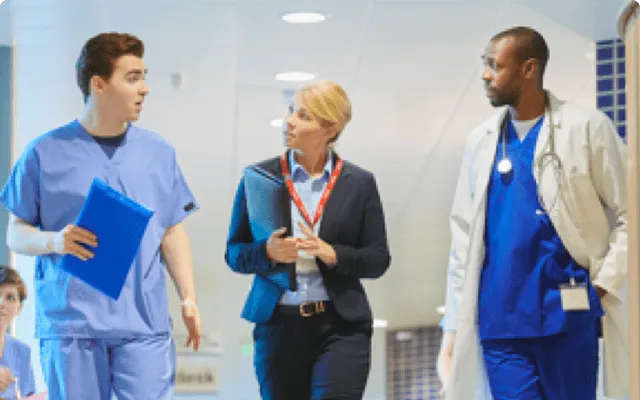 Medlinks healthcare staff walking through a hospital corridor, an HR Cloud Workmates customer