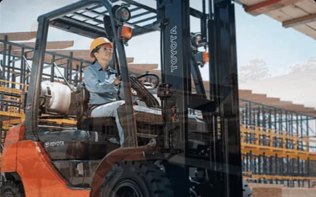 Toyota Material Handling associate operating a forklift, a Workmates customer