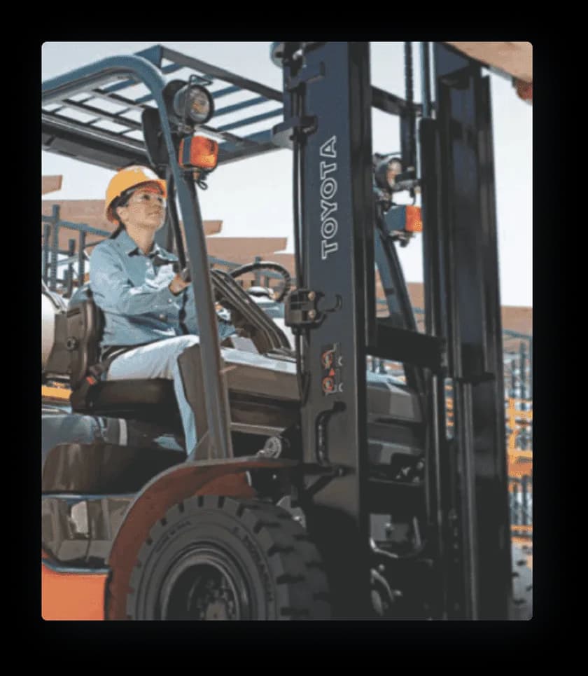 worker operating toyota forklift